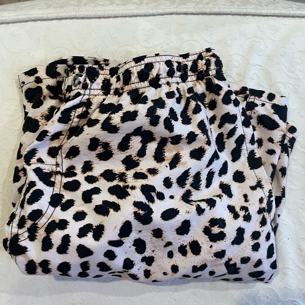 Men’s cheetah bathing suit.